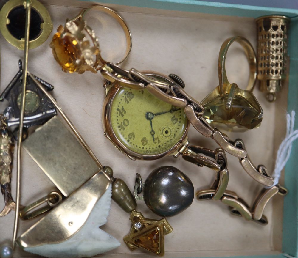 Mixed jewellery including two rings, one 9ct gold, a 9ct watch on 9ct strap, six assorted charms etc.